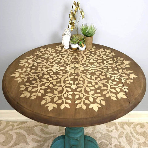 Tree Of Life Mandala Wall Stencil 36 Inch Large Reusable Laser Cut Mylar Template on round wooden table for decor