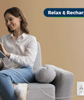 Woman relaxing on couch with tablet, charging via 4.2A Go-To 3 Port USB Wall Outlet With Type C And Type A Ports 15 Amp Receptacle
