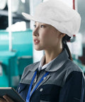 Kickass White Anti Static Mesh Working Hat With Super Breathable Ventilation Dustproof Protective Safety Cap For Food Pharma Electronics Jobs And Real Deal Shop Grinds worn by a woman in a work setting.