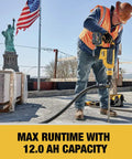 Worker using a power tool with Swappable Power Tool Battery With A Rock Solid 12 Amp Hour Run Time For 20V And 60V Max Systems.
