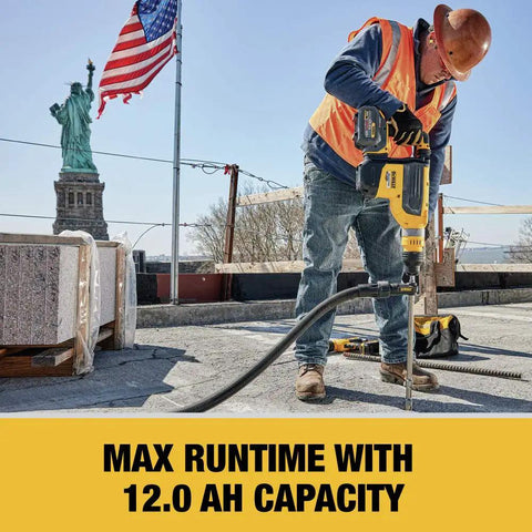 Worker using a power tool with Swappable Power Tool Battery With A Rock Solid 12 Amp Hour Run Time For 20V And 60V Max Systems.