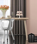 40 Piece Rubber End Cap Set In Black Vinyl Four Sizes 0.125 Inch 0.25 Inch 0.375 Inch And 0.5 Inch Round Tip Caps next to a table.