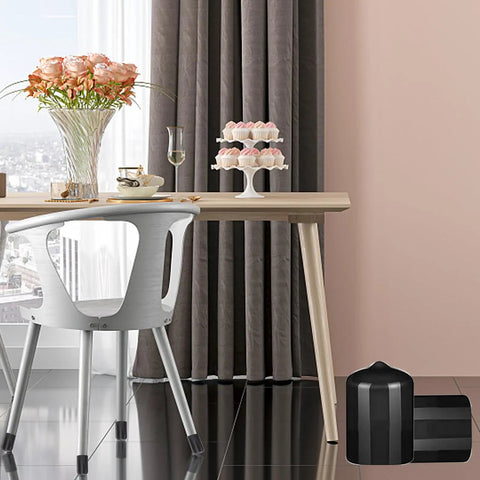 40 Piece Rubber End Cap Set In Black Vinyl Four Sizes 0.125 Inch 0.25 Inch 0.375 Inch And 0.5 Inch Round Tip Caps next to a table.