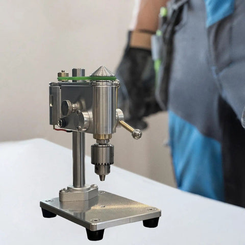 Compact Mini Drill Press For Benchtop Use Portable Clamp Holder Perfect For Jewelry Making And Small Repairs With Universal Chuck Support, silver metal design.
