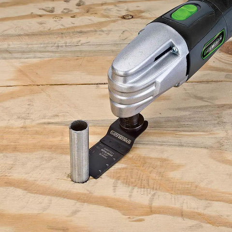 Powerfully Versatile Oscillating Tool Kit With 19 Piece Accessory Set 21000 Oscillations Per Minute cutting metal pipe on wood