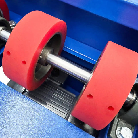 Close-up of red rollers on the Shop Grade Electric Drum Rotator And Mixer Portable Steel Roller for Heavy Duty Oil Barrels.
