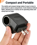 Plug And Play AC DC Car Cigarette Lighter Adapter Converter held in hand, compact design with indicator light for easy charging.