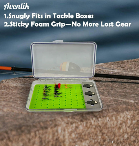 Open tackle box with flies and hooks, showcasing Hook Threader Tool Set With Line Cutter Zinger Retractor Fly Patch Combo For Easy Tying.