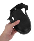 Heavy Duty Steel Toe Shoe Covers With Adjustable Strap Safety Overshoes For Work, black breathable fabric, held in hand.