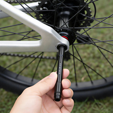 Hand installing Rear Thru Axle To 9mm Quick Release Hub Skewer Adapter For 12mm Rear Hubs Converts 12mm To 9mm QR On Mountain And Road Bikes