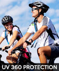 Two people cycling outdoors wearing helmets and sunglasses under UV 360 Protection.