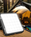 Rechargeable 20000mAh LED Camping Lantern With 1300 Lumen Brightness, lighting a tent in a forest, charging a phone via USB.