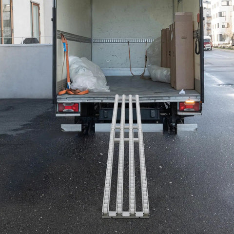 Sturdy 12 Inch Wide Foldable Unpowered Conveyor Table With Galvanized Iron Frame And PE Rollers in truck for easy loading.