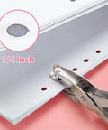 One Quarter Inch Single Hole Punch With Soft Grip Handles punching paper, showing 1/4 inch hole size, 6 sheet capacity, close-up view.