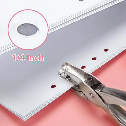 One Quarter Inch Single Hole Punch With Soft Grip Handles punching paper, showing 1/4 inch hole size, 6 sheet capacity, close-up view.