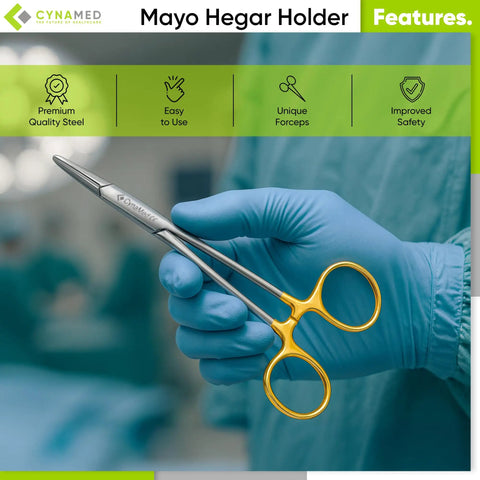 TC Mayo Hegar Needle Holder And Suture Driver With Tungsten Carbide Inserts And Gold Ring Handles For A Rock Solid Non Slip Grip Premium Grade Seven Inch Medical Instrument held by gloved hand.