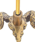 Close-up of Brass Goat Head Cabinet Knob Pull Handle Vintage Animal Drawer Knob For Kitchen Cabinets And Dresser Rustic Metal Cupboard Hardware Durable Goat Head Design With Premium Craftsmanship Ideal Rustic Farmhouse Decor showing textured brass goat head with screw attachment.