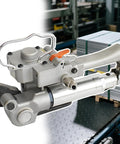 New Style Lightweight Aluminum Pneumatic Strapping Machine With One Button Hot Seal For Pp Pet Banding Up To 3500n Tension, close-up view of strapping tool.