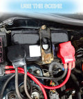 Badass Heavy Duty Battery Terminal Connectors Kit With 2 Gauge Copper Lugs Heat Shrink Tubing Anti Corrosion Washers and Tough Covers for Cars Trucks and Marine Boats shown installed in a vehicle.