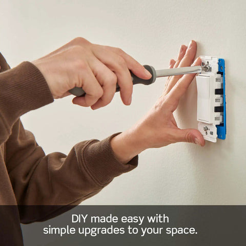 Person installing Lever Edge 15 Amp Single Pole Rocker Switch 10 Pack White Model E5601 MW Fast Wire Insertion on wall