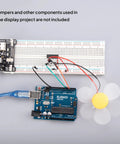 Two 830 Point And Two 400 Point Solderless Breadboards Kit For Arduino Projects with connected board and fan component.