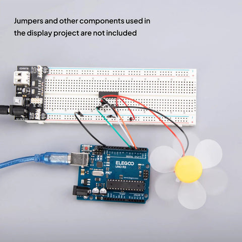 Two 830 Point And Two 400 Point Solderless Breadboards Kit For Arduino Projects with connected board and fan component.