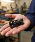 Heavy Duty Barrel Style Detachable Hinges For Cabinets And Garage Doors held in hand, black metal, industrial strength