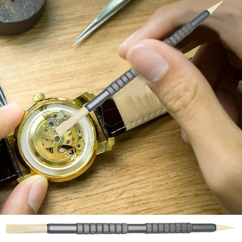 Precision Watch Cleaning Pen With Double Head Rubber Tips for dials, case gaps, and gear clearance in use on a mechanical watch