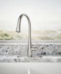 Works Like A Charm High Arch Kitchen Sink Faucet With Pull Down Sprayer And Three Spray Modes Brushed Stainless Steel Build on granite counter.