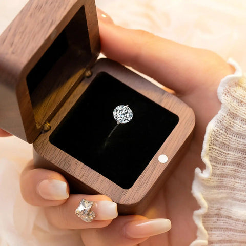 Open wooden box with a ring inside, showcasing the Hidden Brass Hinges With Magnets Set Kit, 80 Pieces For DIY Woodworking.