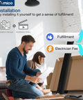 Couple reading installation manual for DIY ceiling fan setup in living room, highlighting fulfillment from self-installation.