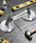 Heavy Duty Glass Suction Cup With Stainless Steel Handle For Lifting Heavy Tiles Smooth Panels And Glass on tile surface with tools.
