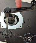 Professional Router Table Lift Featuring Spot On Crank Height Adjustment and Tight Reducing Rings for No Sweat Bit Changes with detailed manual crank.