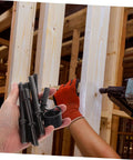 Heavy Duty Pneumatic Rivet Tool Kit With Air Chisel in hand, construction site background
