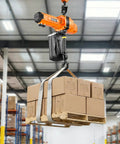 Heavy Duty 2200 Lbs Electric Chain Hoist With 10 Ft Lift, 120V Single Phase Motor lifting a pallet of boxes in a warehouse.