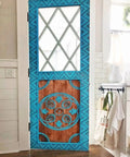 Blue Hand Carved Custom Built Door For Interior Or Exterior Use Antique Barn Style Sliding Or Hinged Door Front Or Pantry Door Sized 71x34 Inches Glass And Hardware Not Included, shown in a white kitchen setting.
