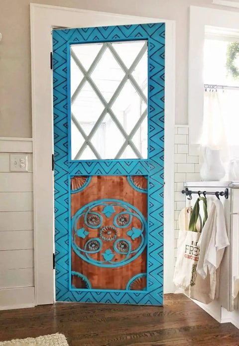 Blue Hand Carved Custom Built Door For Interior Or Exterior Use Antique Barn Style Sliding Or Hinged Door Front Or Pantry Door Sized 71x34 Inches Glass And Hardware Not Included, shown in a white kitchen setting.