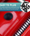 Close-up of installed Six Pack Heavy Duty Hydraulic Jack Oil Fill Plug Universal Rubber Filler Bung on a red bottle jack