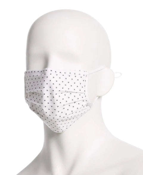 Model wearing white mask from Six Pack Reusable Pleated Cloth Face Masks With Assorted Prints And Colors, One Size, Cotton, Washable