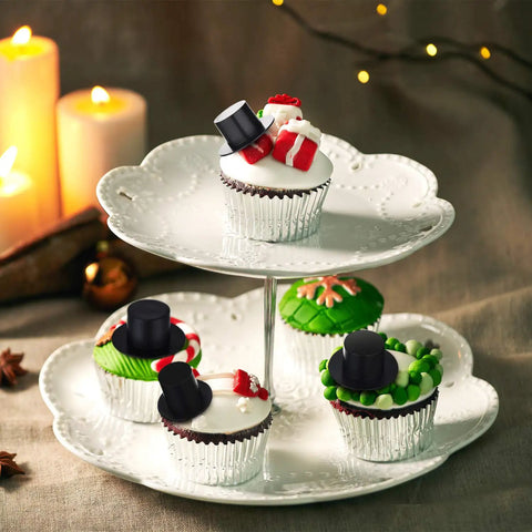 Cupcakes decorated with mini black top hats from Awesome Christmas Craft Button Kit with 700 Pieces.