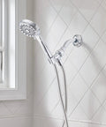 Ignite Chrome Handheld Shower Head With 2.5 GPM High Pressure Spray Five Settings Easy Install Detachable Hose in bathroom