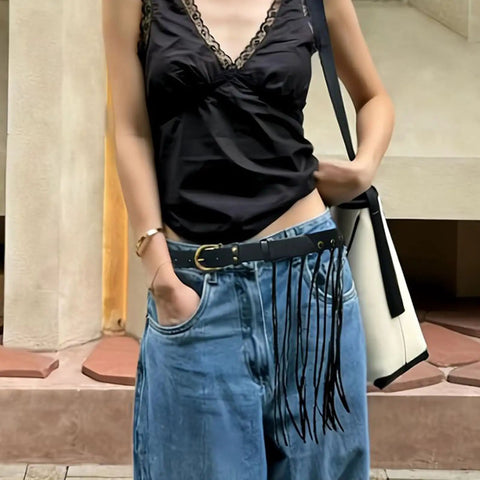 Vintage Industrial Waist Belt Featuring Heavy Copper Hardware And Flowing Tassels With Easy Adjustable Strap In Warm Coffee Brown For Daily Wear That Gives Serious Drip worn with casual outfit.