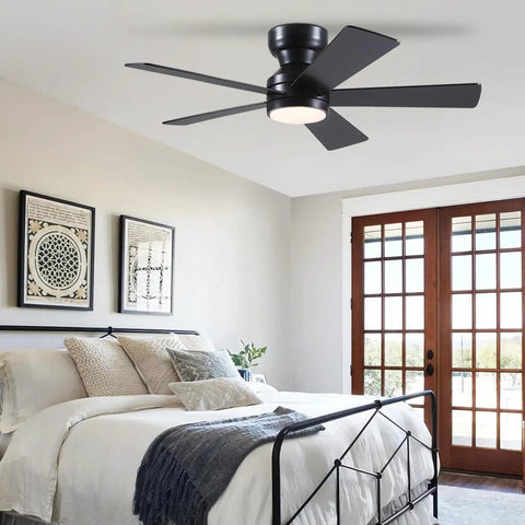 Sleek 46 Inch Flush Mount Ceiling Fan With Integrated Light Kit And Wireless Remote, installed in a modern bedroom.