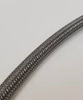Braided stainless steel oil line hose with chrome finish for Harley oil pressure gauge kit; includes chrome fittings