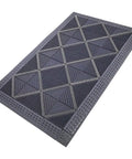 Heavy Duty Outdoor Rubber Doormat With Interlocking Tiles Waterproof And Easy Clean DIY Assembly 47 Inch By 29 Inch Entrance Mat Built Tough As Nails For Any Weather Slip Resistant Easy Care Durable, top view showing textured pattern.