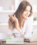 Woman working at desk with 30 Pack Clear Plastic Name Tent Holders For Desk 11 Inch By 4.25 Inch Acrylic Name Plates displayed.