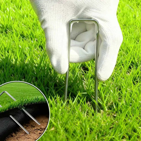 57 Pack 4 Inch Galvanized U Shaped Garden Stakes For Landscaping Ground Yard Fence Projects Heavy Duty 12 Gauge Tent Stakes Pins For Weed Barrier Fabric Outdoor Decor being installed in grass