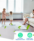 Living room with children playing, featuring a 3 Pack True HEPA Replacement Filters For Air Purifiers Top Notch Odor Free Filter.