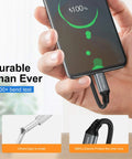 Braided USB-C to USB-A charging cable, 6 ft, gray, SMALLElectric, plugged into phone