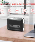 Portable Tape Player With Earphone Jack And MP3 Converter, Retro Cassette To Digital On The Go next to laptop on wooden desk
